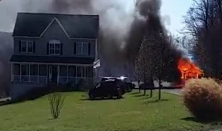 Backfiring Engine of Lawn Tractor Sparks Fire; Destroys Shed in Street