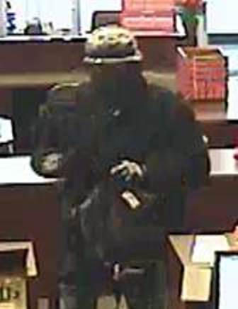 Police Release Photos of Suspect Wanted in Armed Robbery of NBRS Bank in Street Thursday
