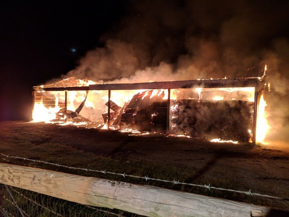 Fire Destroys Barns in Darlington and White Hall