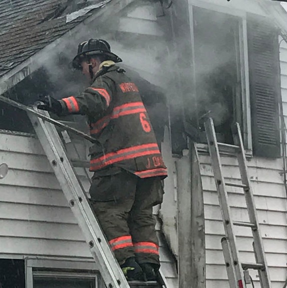 Malfunctioning Furnace Sparks Fire in Attic of Street Home